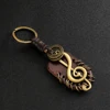 Angyape 2022 Fashion vintage brown Genuine Leather wing compass Music Symbol keychain handwork alloy Accessories men key chain ► Photo 2/6