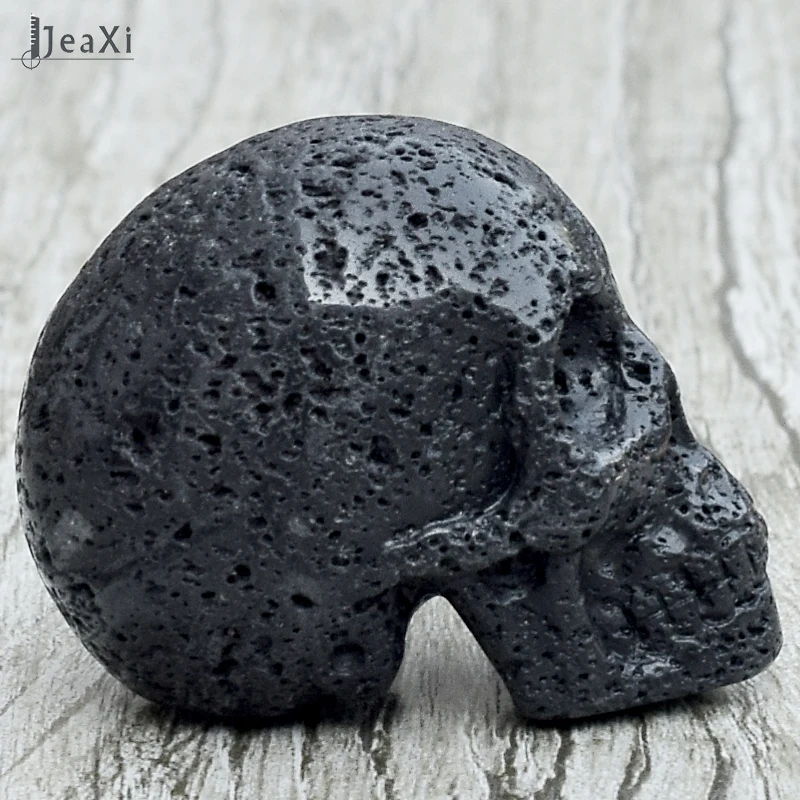 Impresionante estatua de calavera de Lava negra de 2 pulgadas piedra volcánica natural figura de calavera tallada a mano de cristal de cuarzo hueso feng shui sanación