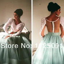 Maryam Omaira, платье знаменитостей, платье с красной ковровой дорожкой, Myriam Fares, v-образный вырез, длина до пола, длинный рукав, белое и зеленое бальное платье