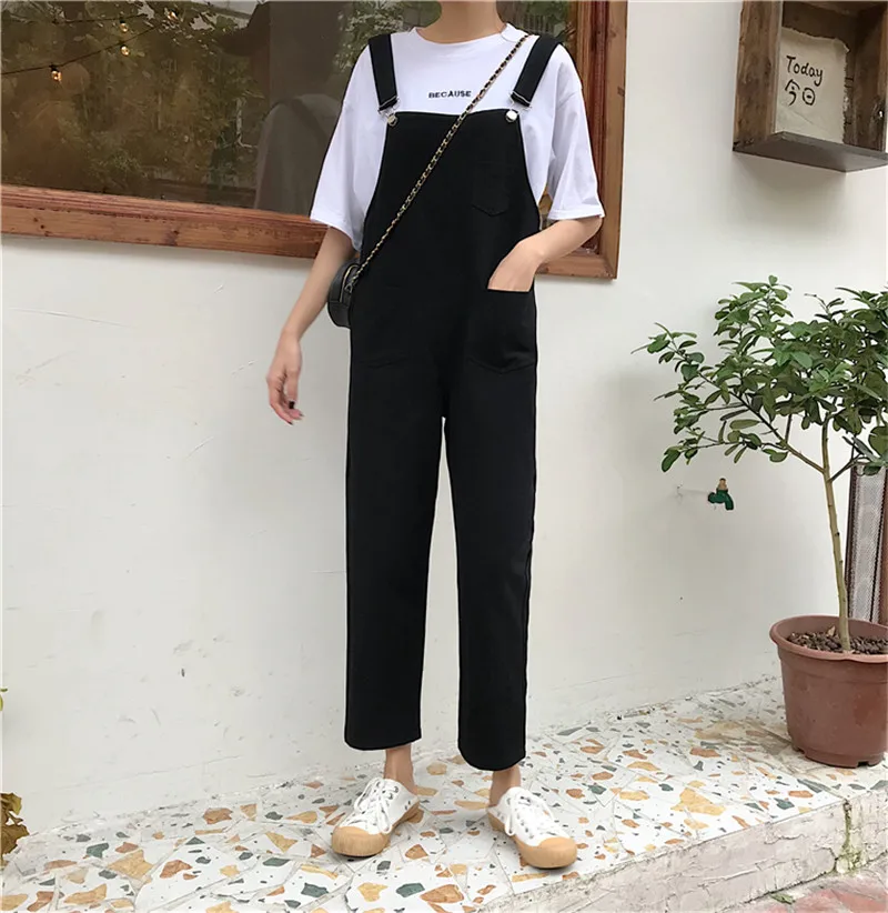 loose black dungarees