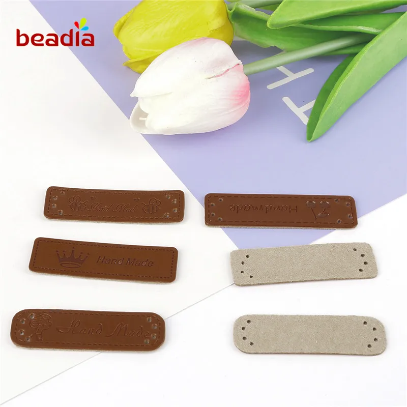 

High Quality 12pcs/lot Multiple Shapes Hand Made Labels for Jewelry Clothes Garment PU Leather Labels Jewelry Sewing Accessories