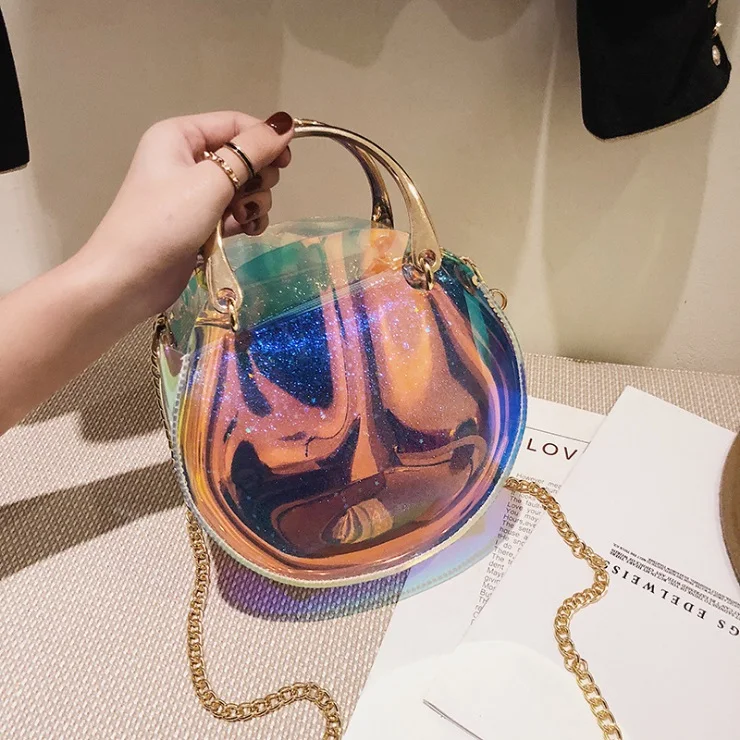 

Yuhua, 2019 new fashion woman handbags, circular messenger bag, korean version laser women bag, trend shoulder bags.