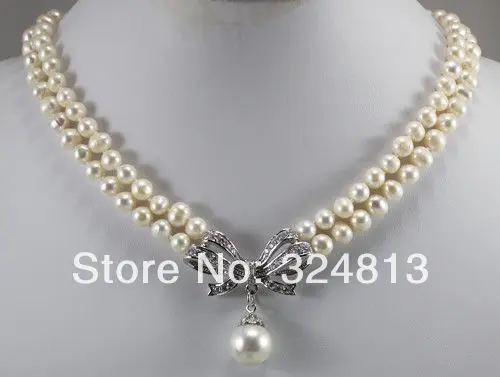 

row white/pink/black pearl necklace + Inlay crystal bow 18kgp pendant