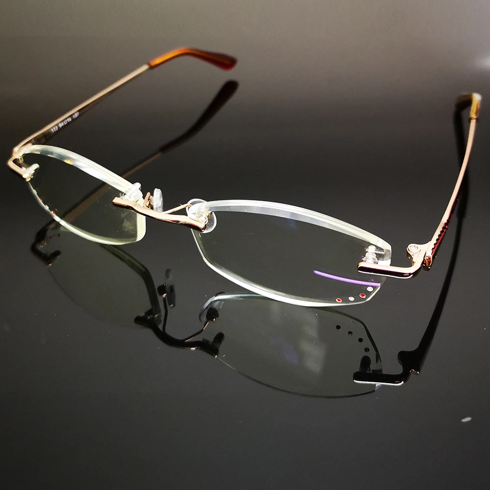 https://ae01.alicdn.com/kf/HTB1xONRX0zvK1RkSnfoq6zMwVXa1/Luxury-British-Lady-Diamond-Cutting-100-Titanium-Alloy-Rimless-Frameless-Reading-Glasses-Box-0-75-1.jpg