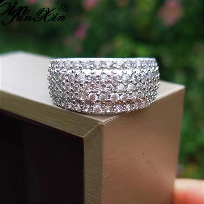 

JUNXIN Female Male White Crystal Round Wedding Ring Silver Color Small Zircon Stone Engagement Rings For Women Men Bride Jewelry