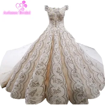 

2018 Luxury Arabic Champagne Lace Sleeveless V-neck Long Train Bride Dress Lace Up Waves Ball Gown Vintage Wedding Dresses Real