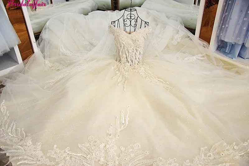 Real Image Luxury Wedding Dresses 2019 Vsetido De Novia Crystals Lace Wedding Dresses Beading Appliques Royal Train Bridal Gowns