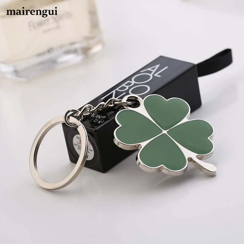 

Pop four-leaf clover keychain women jewelry bag pendant lucky grass car keyring for BMW porsche volvo opel Toyota key chain ring