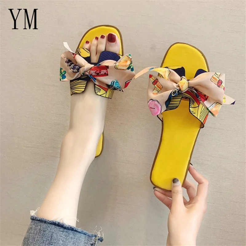 

Hot Summer Flat Heel Women Cut Out Ladies Sandals Ladies Bohemia Sandals With Knot Flat Shoe Candy Color Outdoor Holiday Slides