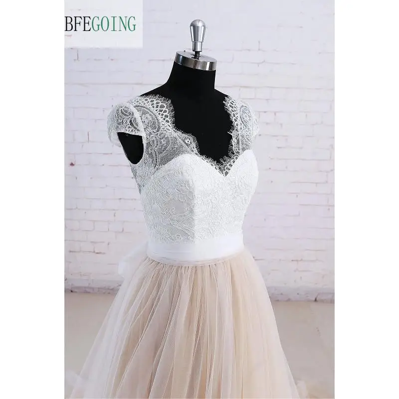 Ivory Floor Length Tulle V-neck Cap Sleeve A Line Lace Wedding Dress