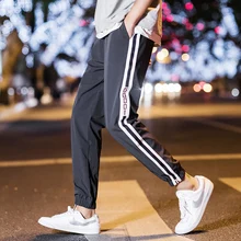 Men Sweatpants Stripe Pencil Pants male Regular Fit Sportswear Trousers fashion new mens joggers pants Men Sweatpants Stripe Pencil Pants male Regular Fit Sportswear Trousers fashion new mens joggers pants