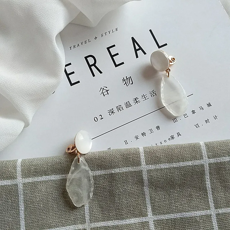 

New autumn and winter geometric iceberg snow mountain ice white temperament funky stud earrings clip earrings