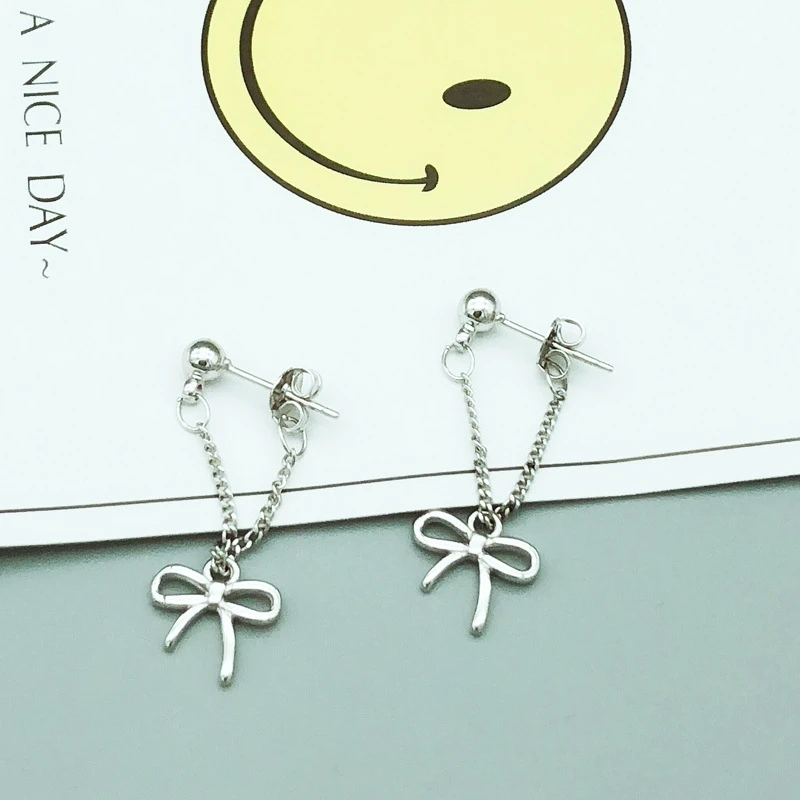 

Bow Hanging Korean Simple 925 Sterling Silver Temperament Personality Fashion Female Earring SEA059