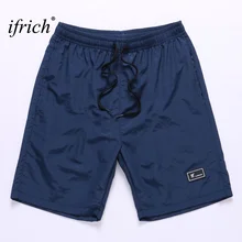 Мужские шорты, летние пляжные новые модные шорты с карманами, мужские однотонные свободные дышащие черные шорты с эластичной резинкой на талии, мужские шорты