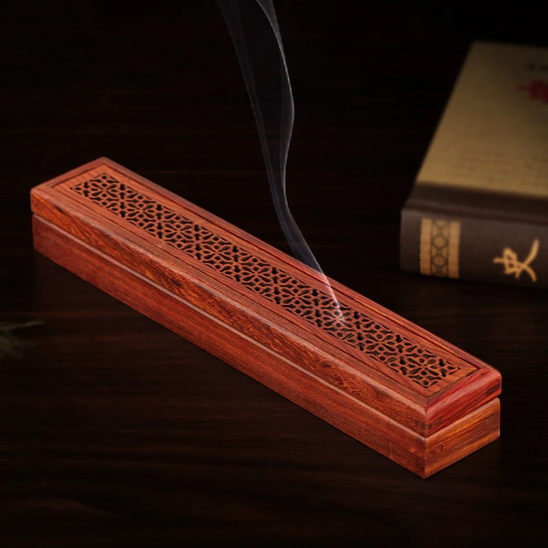 A mahogany red sandalwood incense box lying for incense sandalwood