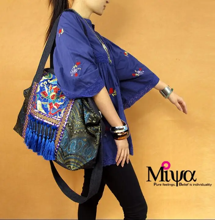 

Hot sale Naxi.Hani Original Ethnic handmade embroidered shoulder bags Vintage blue denim tassel lagre casual messenger bags