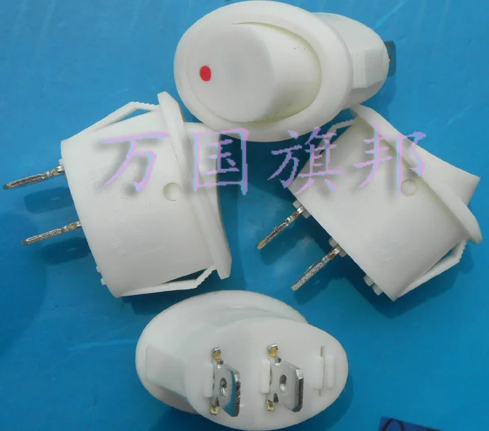 

Free Delivery. 6A 250V rocker switch boatlike switch feet 2 feet two white oval gear