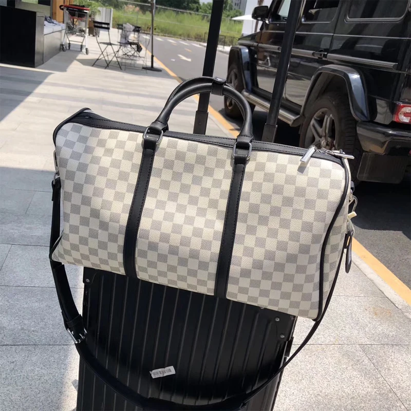 

Hot! Popular brand Travel bag Luxury PU hand luggage bag carry on suitcase women men travel boarding valise new fashion bag