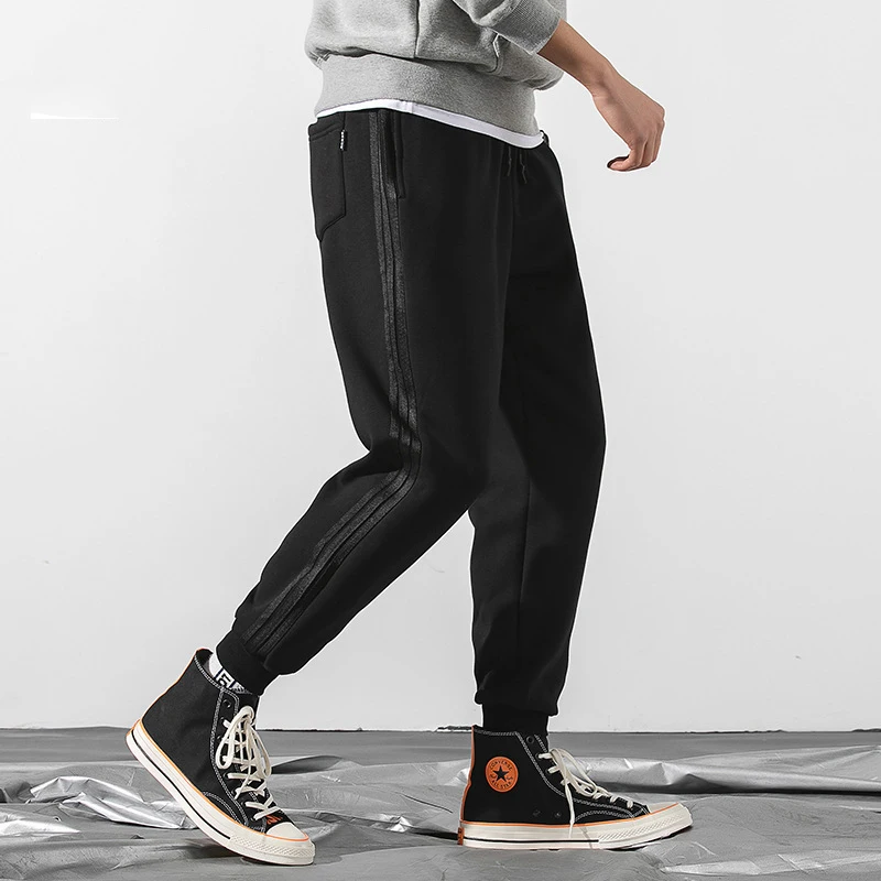 Europe and the United States 2019 new men's casual wild print men's sports pants running fitness breathable pants tights Europe and the United States 2019 new men's casual wild print men's sports pants running fitness breathable pants tights