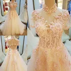 Save 21.9 on Real Photo A-Line High Neck Lace Up Court Train Appliques Pearls Sequins Wedding Dress 2017 With Beaded Mariage Wedding Gowns