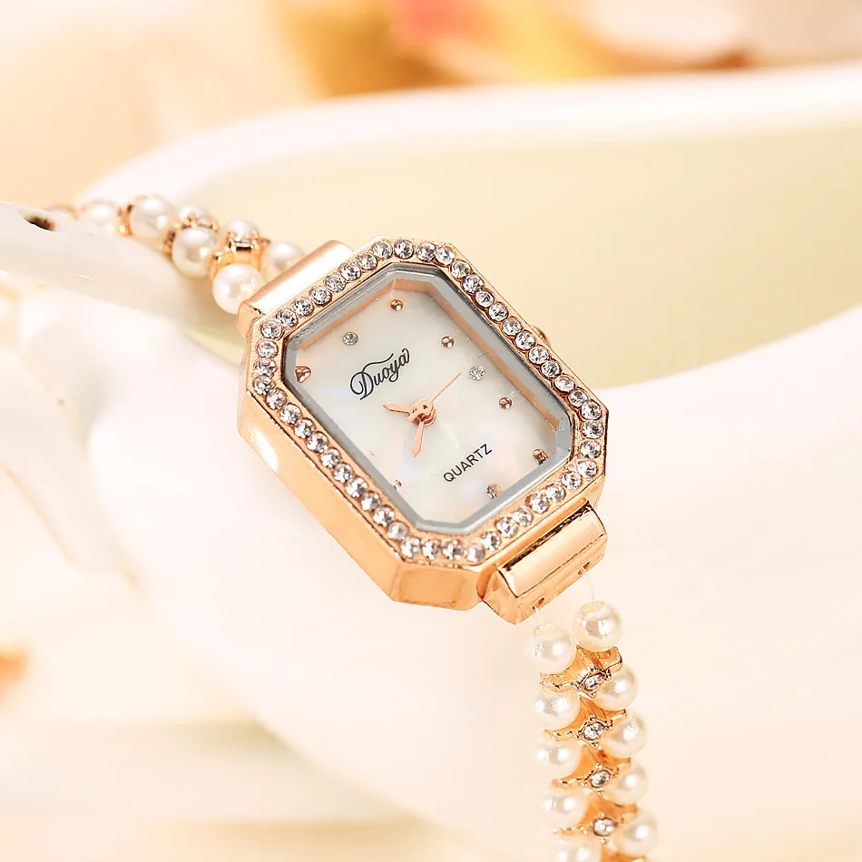 Лидирующий бренд кварцевые женские часы золотистое жемчужное ожерелье стальной браслет часы женские хрустальные relogios feminino