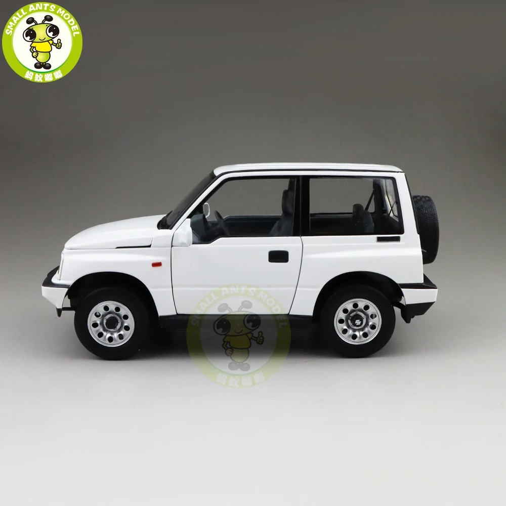 1/18 DORLOP Suzuki Vitara Escudo с левым приводом Модель автомобиля игрушки детские подарки для мальчиков девочек белого цвета