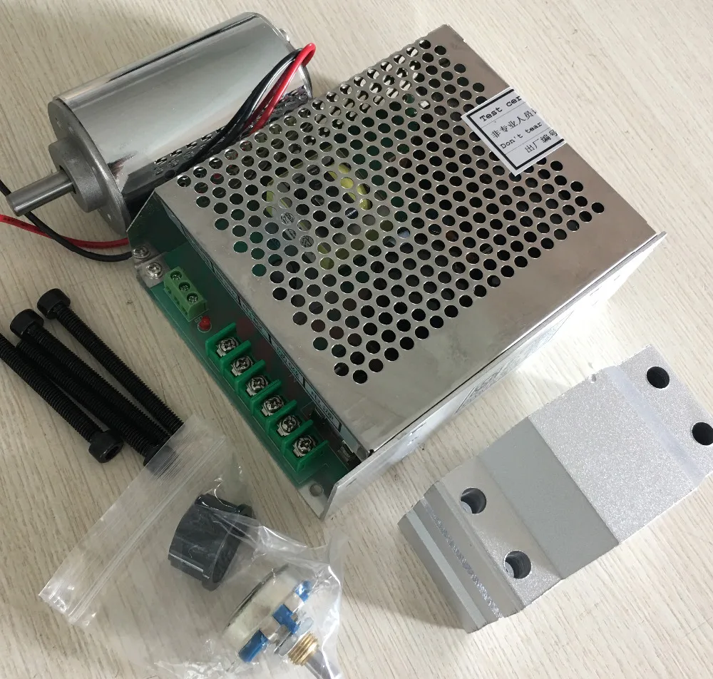 

200w dc motor + 52 mm clamp (send four screws) + Speed control power supplyPower Supply Speed Governor For DIY Engraving