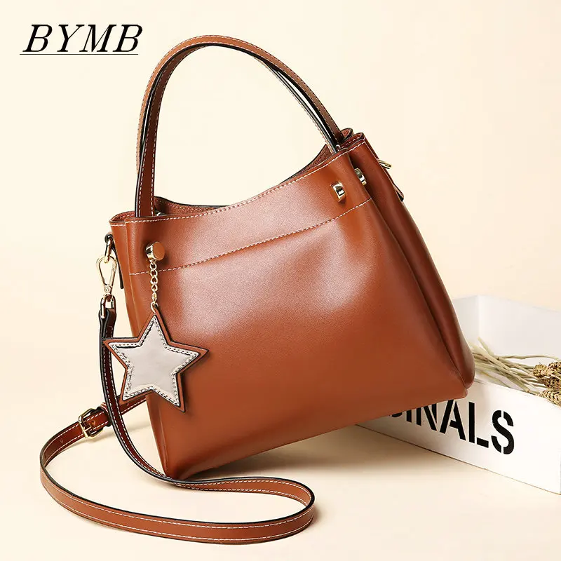 

2018 High quality leather bag handle bill of lading shoulder bag Genuine leather bag large capacity lady bag.