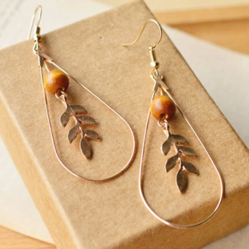 

Korean temperament simple fan stone round beads retro geometric triangle round leaves earrings female