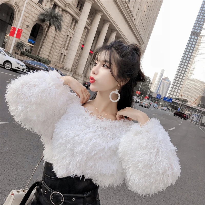 

temperament Women's Clothing o-neck knitted tassel Sweaters pullovers autumn winter loose fashion tops vestidos femininos new