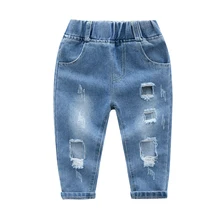 Новые джинсы для мальчиков на весну и осень модные Универсальные детские брюки классические синие универсальные брюки с большими дырками