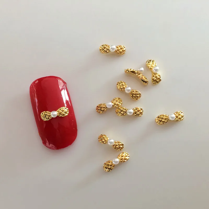

100pcs Japanese and Korean Mini Metal Jewelry Golden Pearl Butterfly Knot Phototherapy Nail Sticking Nail Jewelry