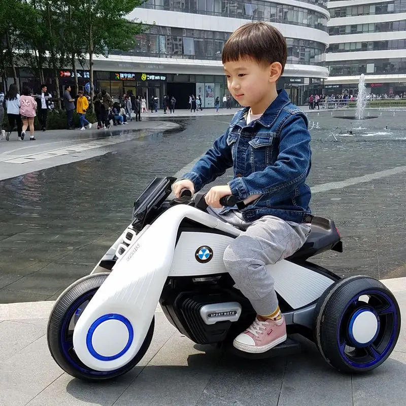 

2018 new children's multi-function electric motorcycle men and women baby can sit children's toy car