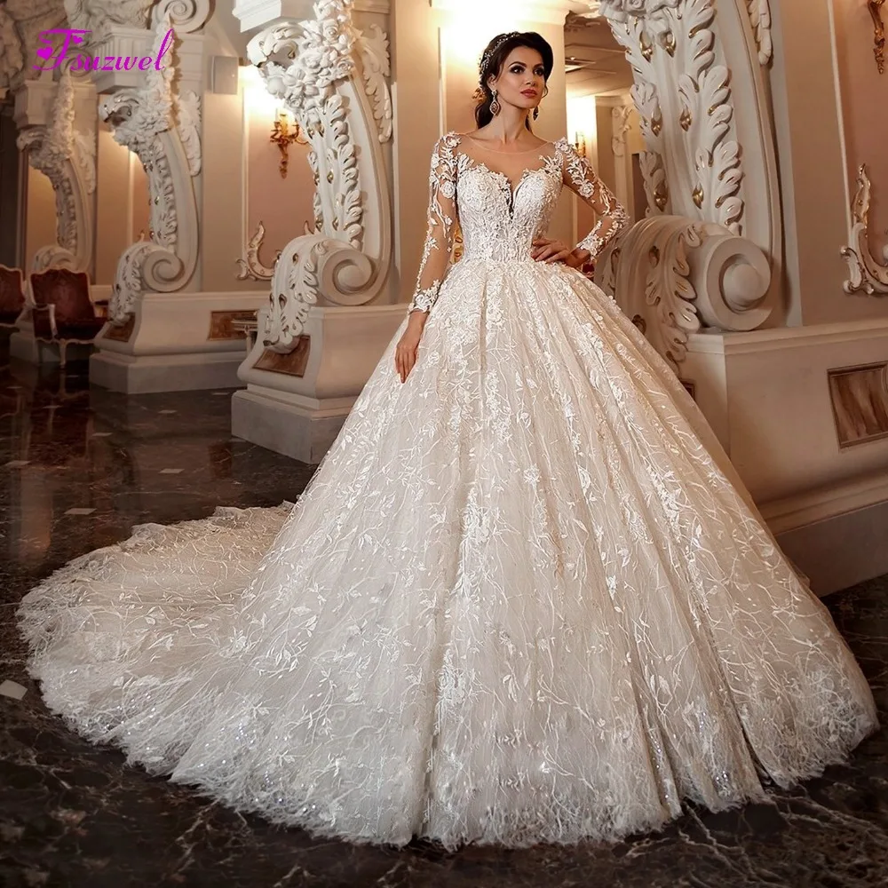 Günstige Fsuzwel Wunderschöne Appliques Kapelle Zug Spitze Ballkleid Hochzeit Kleid 2019 Sexy Scoop Neck Langarm Perlen Prinzessin Braut Kleid