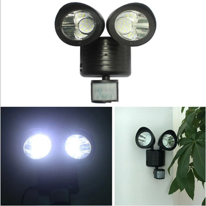 

22 LED double head Solar Light Led spotlight LED solar lamp body sensor ligh outdoor garden doorway corridor wall lamp