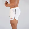 Marque été Fitness Shorts hommes maille respirant plage Shorts élastique séchage rapide pantalons courts mince gymnases entraînement Joggers Shorts mâle ► Photo 1/6