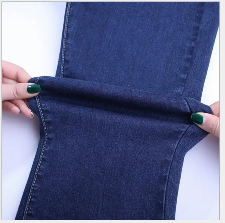 Летние женские эластичные джинсы больших размеров из хлопка высокого качества с толстыми мм, модные Необычные расклешенные брюки на плоской подошве