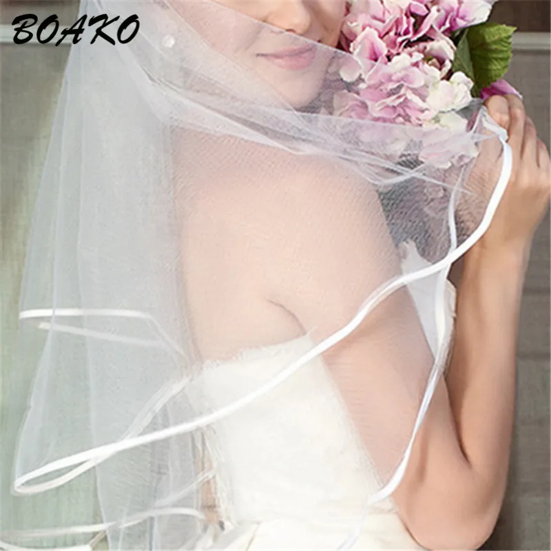 BOAKO 150CM Short Wedding Veils with Comb One Layer Ribbon Edge Tulle Bridal Veil White/Ivory Cheap Wedding Accessories 2019 New BOAKO 150CM Short Wedding Veils with Comb One Layer Ribbon Edge Tulle Bridal Veil White/Ivory Cheap Wedding Accessories 2019 New