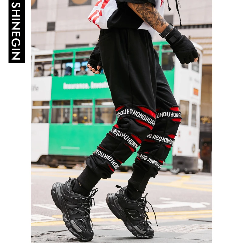 SHINEGIN Ripped tapered pants 2019 men joggers pants street style hip hop sweatpants 2019 new arrival brand leisure pants 071W