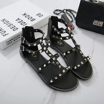 

2019 summer new style simple and simple solid color Roman style sandals women comfortable wild rivet decorative casual sandals.