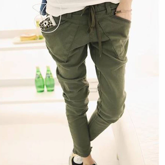 After we find it: Simple white tshirt with army green jeans olive skinny jeans and brown ankle boots combat boots minus the furry vest Khaki green pants, brown combat bootss, white t .