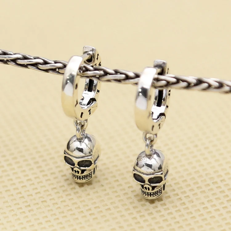 

S925 sterling silver jewelry punk wind earrings skull ring earrings men and women Korean version of personality fashion ear