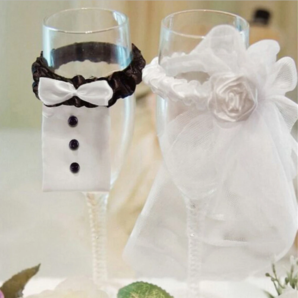 

2Pcs/Lot DIY Wine Cups Wraps Decoration Ornaments Champagne Glass Bottles Cover Wedding Bride Groom Dress Wedding Party Events