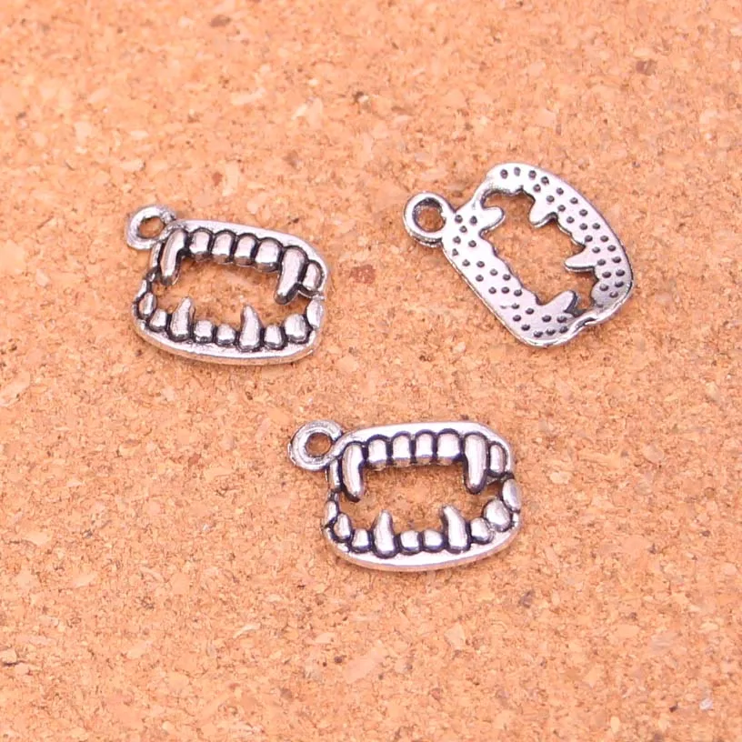 

30pcs Tibetan Silver vampire dracula fangs teeth halloween Charms for Jewelry Making 17*12mm