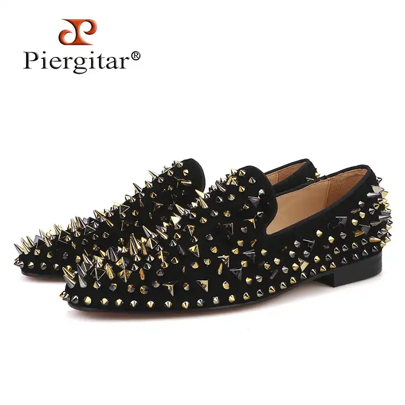 black loafers gold spikes