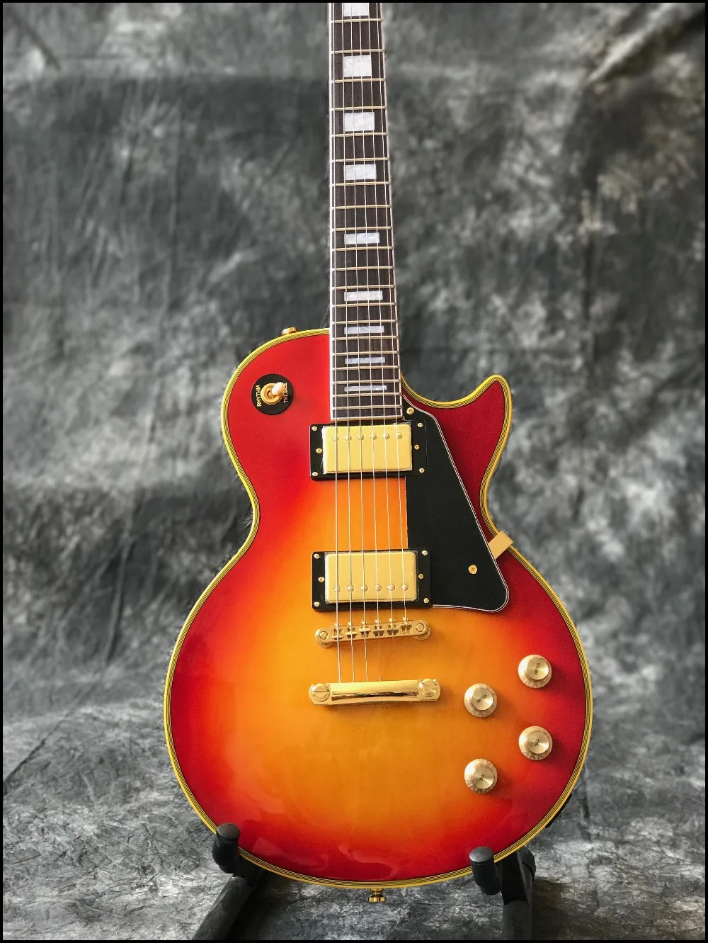 

New arrival Chinese electric guitar in cherry burst color ,with gold color hardware , high quality guitarra , fast shipping