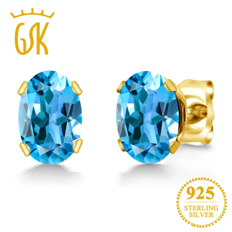 

GemStoneKing 1.10 Ct Oval Shape Natural Blue Topaz Gemstone Earrings Yellow Gold Plated Silver Stud EarringsFor Women