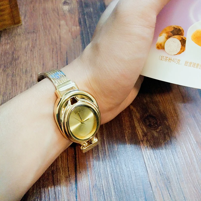 

Luxury Brand Women's Fashion Gold Watches High Quality BGG Stainless Steel Ladies Wristwatches Simple No scale Dial Woman Clock