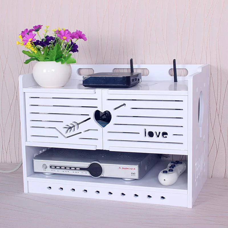 

The router receives a box of wire to receive a box of light cat wifi, and the rack is arranged on the top box.