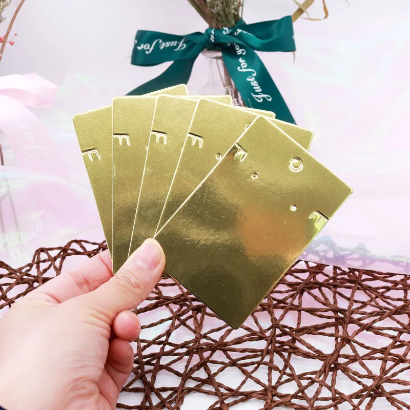 

Hot Sale 50Pieces/Lot 6X9CM Earrings Display Fashion Jewelry Golden Card Customized Logo Handmade Earring Packing Card Fashion